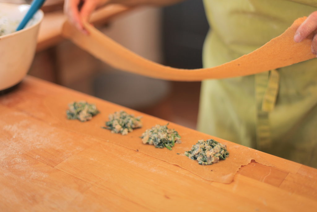 Filling our ravioli with spinach, ricotta and wild garlic!